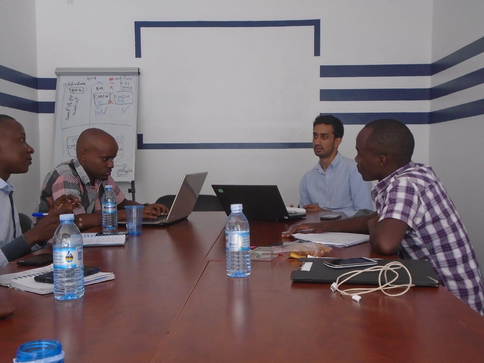 A mentorship session with a representative at Clinton Health Access Initiative Uganda