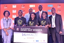 Team Digihealth pose for a photo with the judges at the Up Accelerate Demo day after being announced winners.